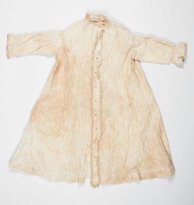 Vestito da bambino bianco in cotone con frange all